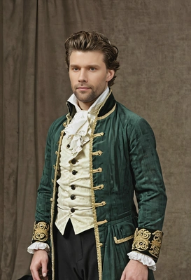 A 19th-century stage actor, in full costume, preparing to go on stage for a performance