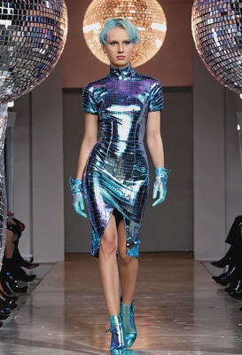 as a fashion model, doing a catwalk, runway, dress made or disco ball pieces, shiny shoes and gloves,  iridescent hair, dynamic walking pose, blurred background, symmetrical details, extravagant